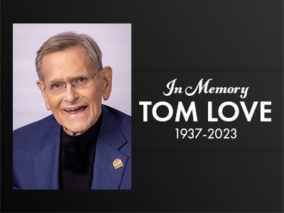 A graphic with a photo of Tom Love and "In Memory, Tom Love 1937-2023" on it