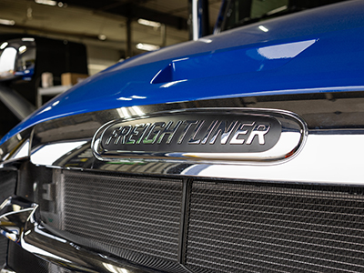 A closeup of a Freightliner commercial truck