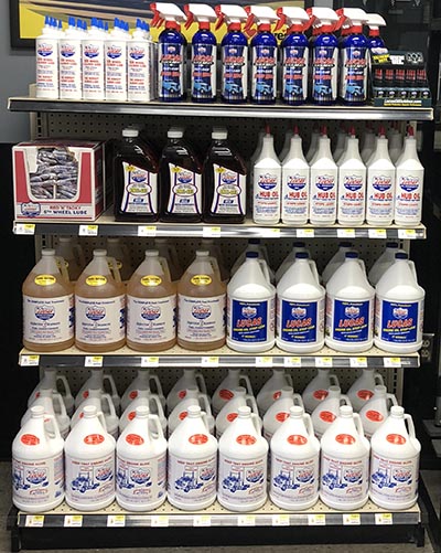 lucas oil products on shelf at loves truck tire care