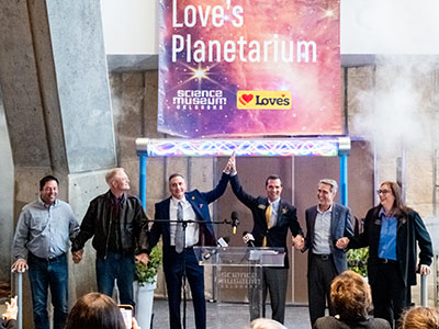 Love's President Shane Wharton and members of the board for Science Museum Oklahoma power the light bar to signal the groundbreaking for Love's Planetarium.