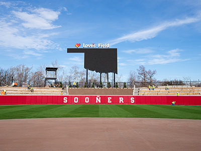 A photo of the scoreboard and construction at Love's Field at the University of Oklahoma