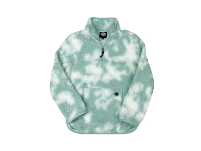 A green and white tie dye sherpa