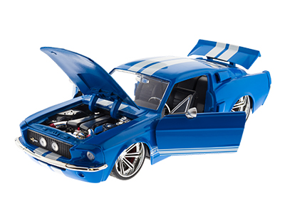 A mini replica of a Shelby GT500 with the hood popped and doors open