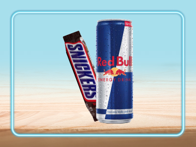 A Snickers and can of Red Bull